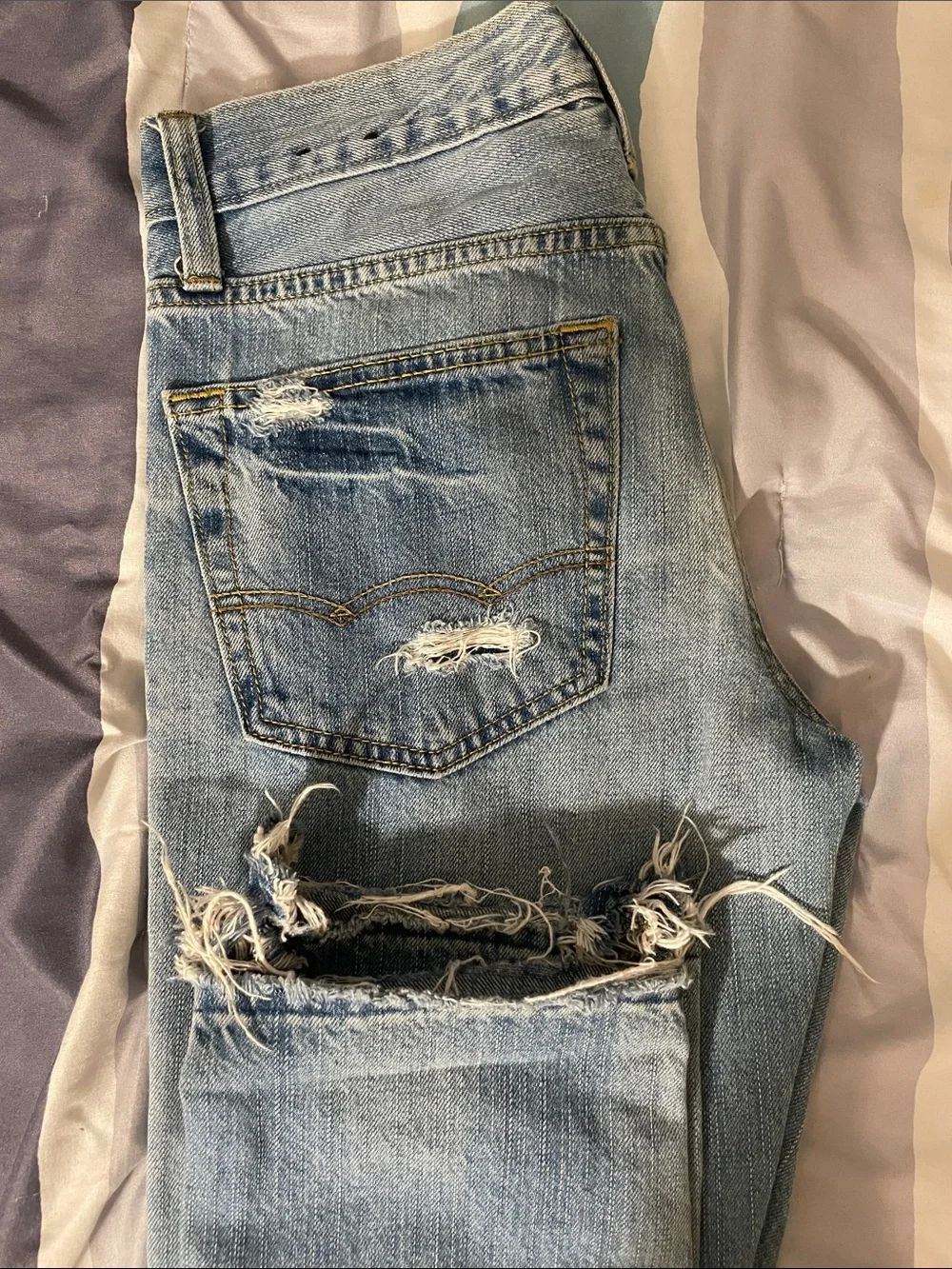 American Eagle Outfitters Slim Distressed Light Blue Jeans